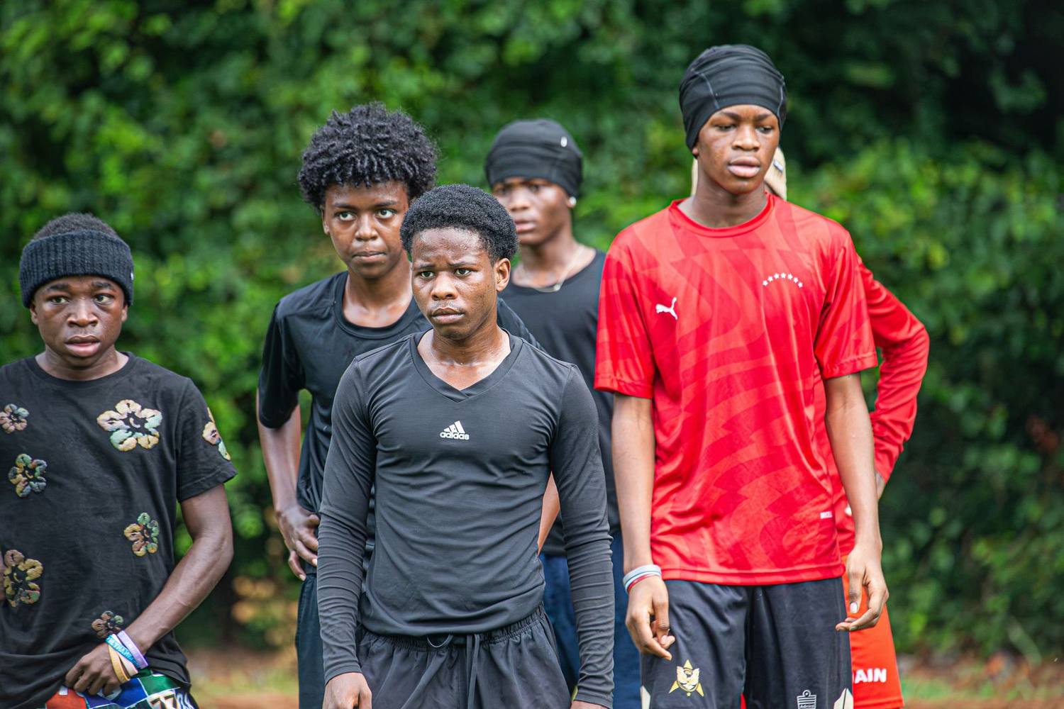 Umoja players on the touchline